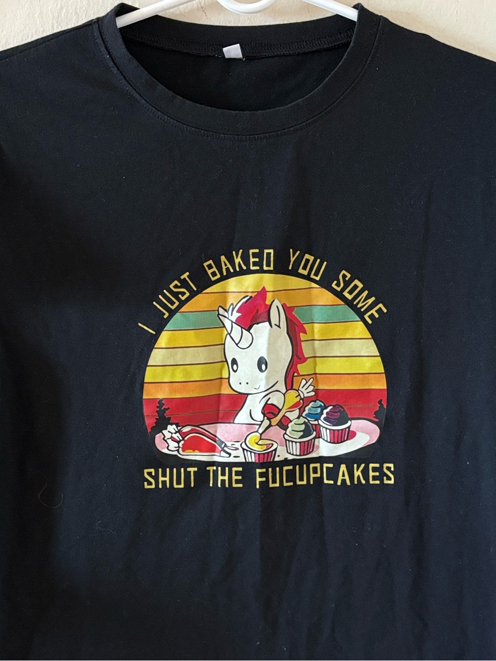 Black Graphic T-shirt with Funny Unicorn Baking Design